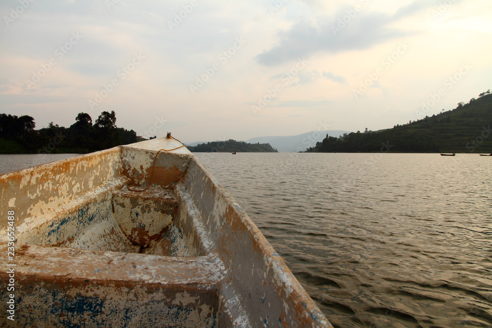 Peeling Boat Reaches Into a Lake