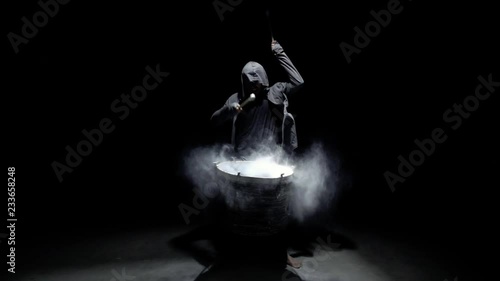 emotional drummer on a black background photo