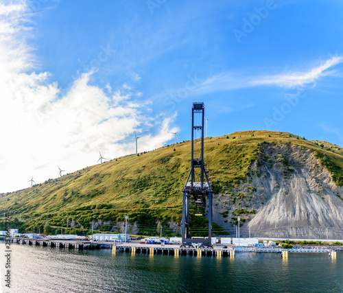 A Container Crane a Type of Large Dockside Gantry Crane Found at Shipping Container Terminals for Loading and Unloading Containers from a Container Ship Located in Kodiak Alaska