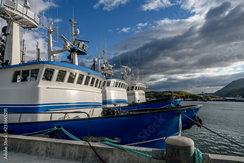 A Front Bow View of Alaskan Fishing Crab Boats at Port in Dutch Harbor Alaska © Mark