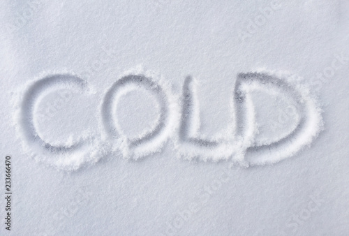 hand written COLD on fresh snow