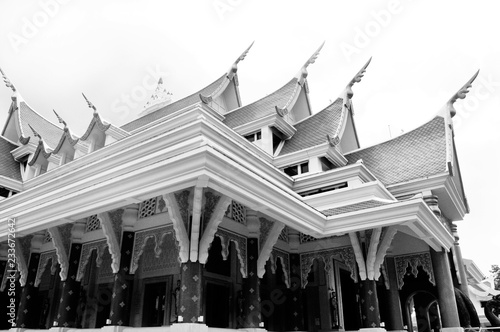 roof temple / beautiful detail of traditional buddhist temple roof in thaiand monochrome photo