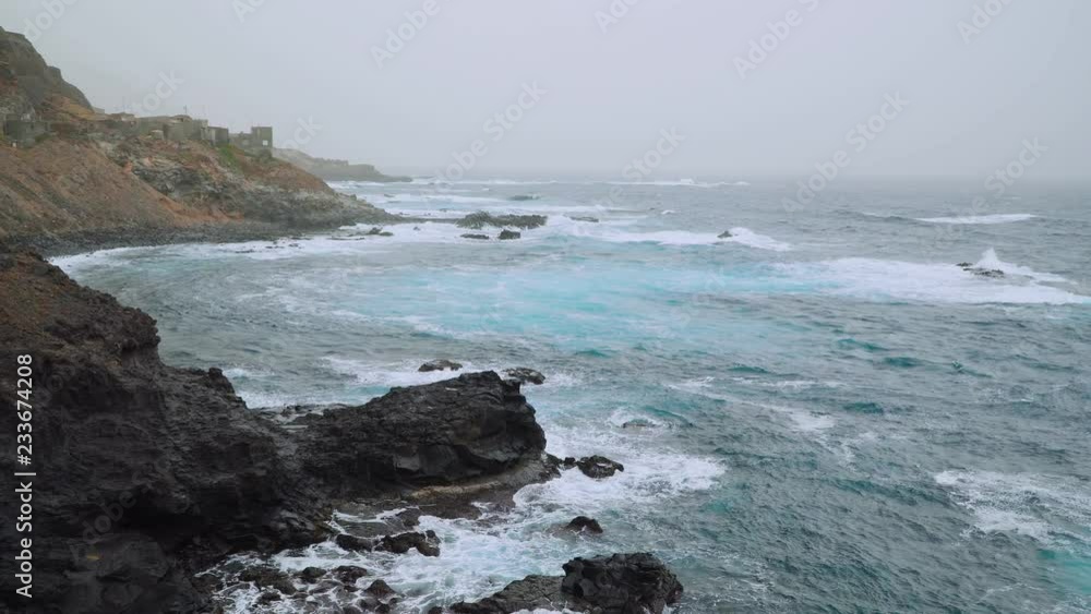 Big swells of the Atlantic ocean. Ocean waves rolling on the rocky coastline of Santo Antao Island. Cabo Verde, Cape Verde. 4K video footage Big swells of the Atlantic ocean. Ocean waves rolling on the rocky coastline of Santo Antao Island. Cabo Verde, Cape Verde. 4K video footage