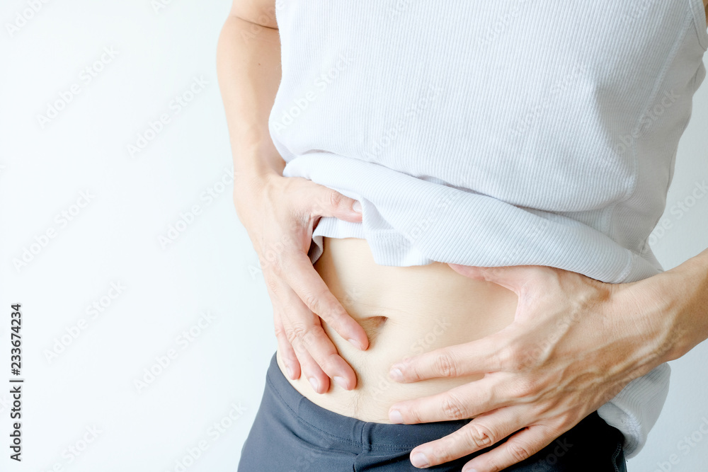 People have abdominal pain. Take a hand from the belly diarrhea.Health concept People have abdominal pain. Take a hand from the belly diarrhea.Health concept