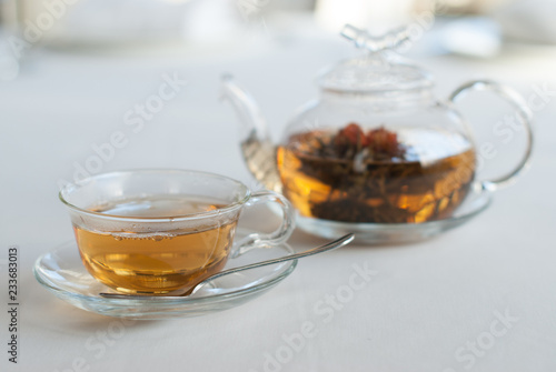 green tea in the glass teapot