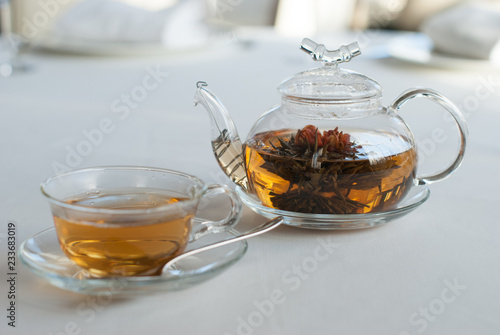 green tea in the glass teapot