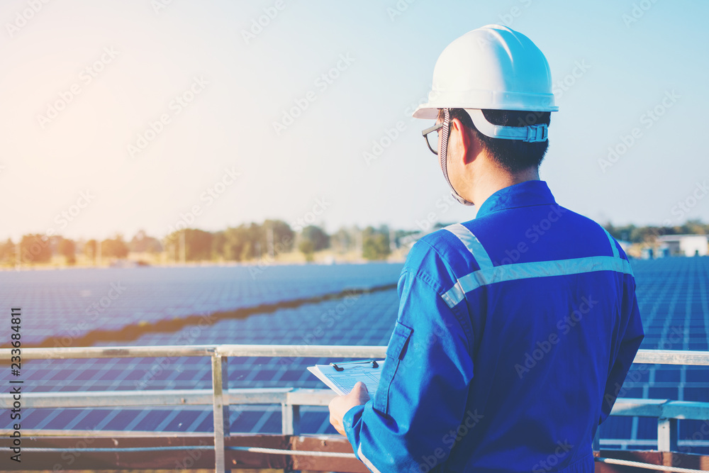 operation and maintenance in solar power plant ; engineering team working on checking and maintenance in solar power plant ,solar power plant to innovation of green energy for life operation and maintenance in solar power plant ; engineering team working on checking and maintenance in solar power plant ,solar power plant to innovation of green energy for life