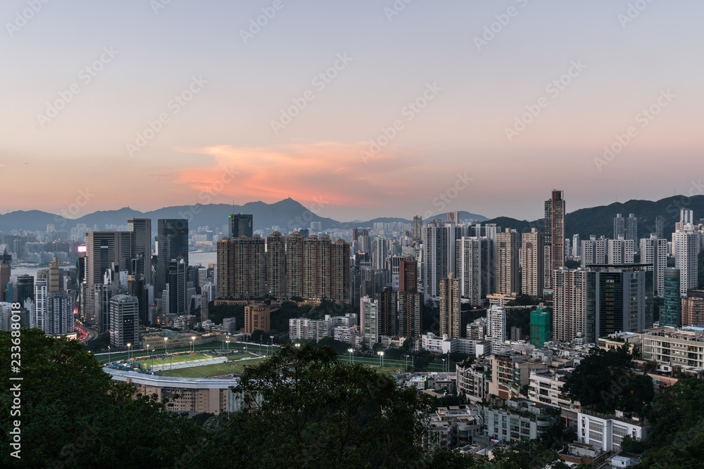 Sunset over Happy Valley district, famous for its horse racecourse  in Hong Kong island, Hong Kong SAR in China