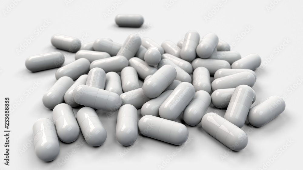Pile of white medicine capsules Pile of white medicine capsules