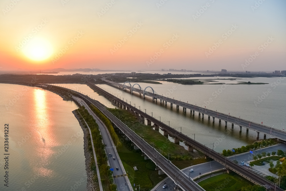 jiujiang cityscape of lake and bridge in sunset
