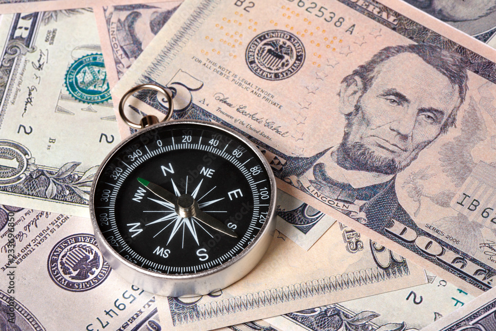 Capitalism Concept : Banknote and Compass Capitalism Concept : Banknote and Compass
