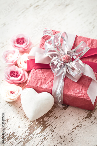 Fototapeta Naklejka Na Ścianę i Meble -  Valentine's Day and mothers day concept, red gift box