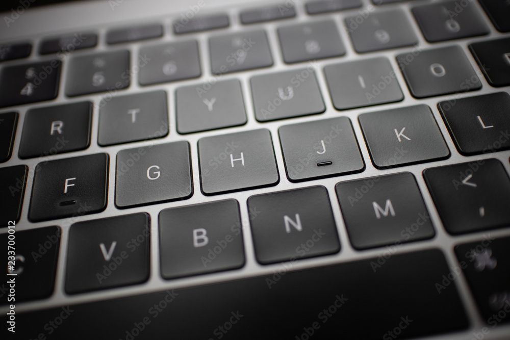 Close up of black keyboard button of a laptop.