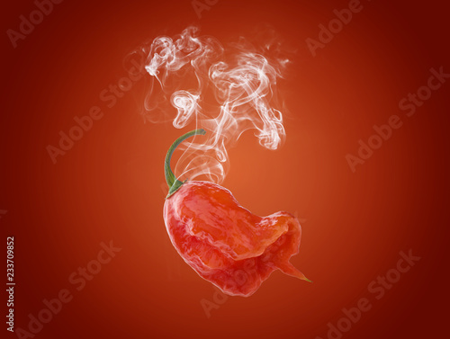 Carolina reaper pepper on red background with white smoke