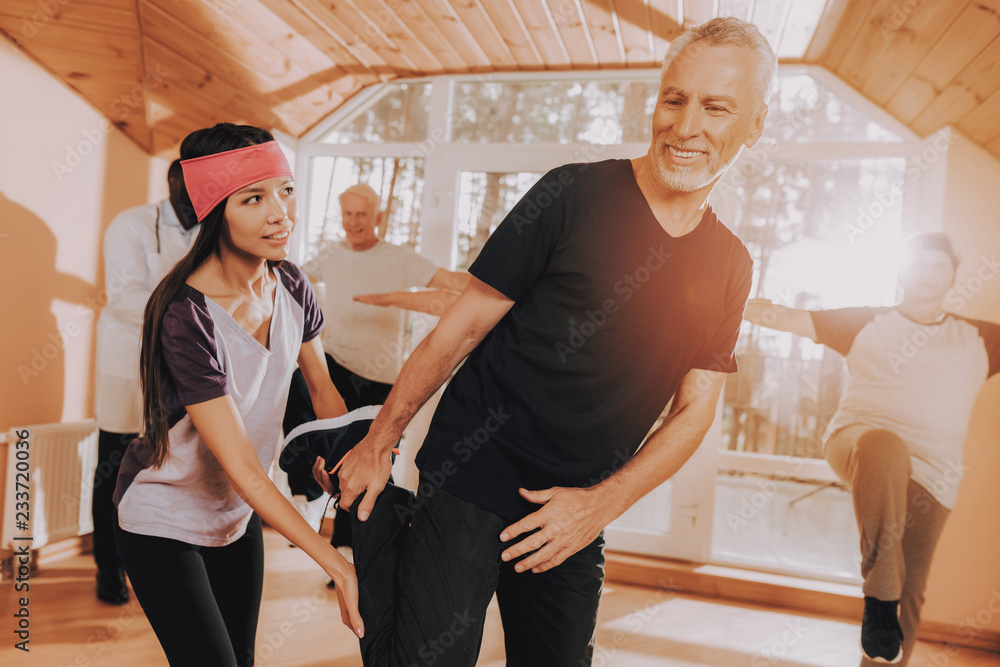 Fototapeta premium Active Retiree Nursing Home. Old Men do Exercises.