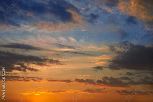 Dramatic sunset sky with orange clouds © lunamarina