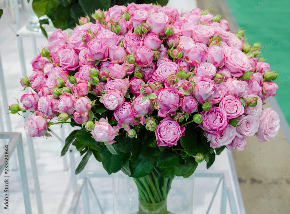 large bouquet of rose flowers in a vase