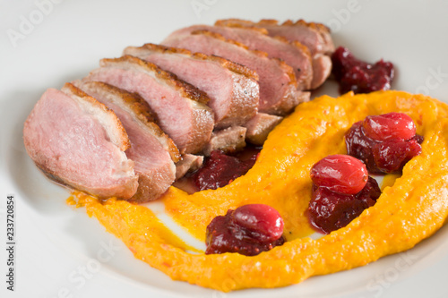 duck breasts with squash puree and cranberries