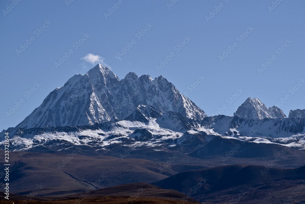 Tibetan holy mountain Mt. Yala with its summit at 5820m, taken from Tagong, Sichuan, China. 