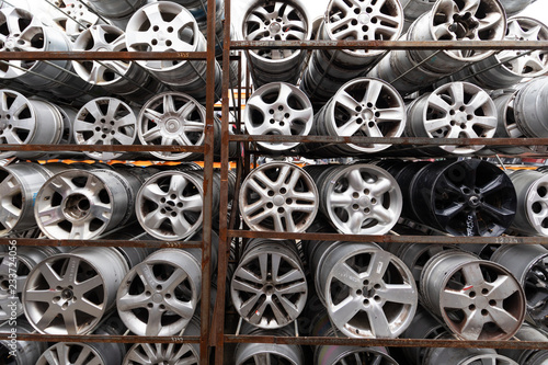 Auto parts market. Car wheels are on the ground.