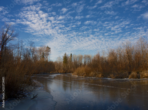 Fototapeta Naklejka Na Ścianę i Meble -  The first thin ice on the river Izh, Udmurtia