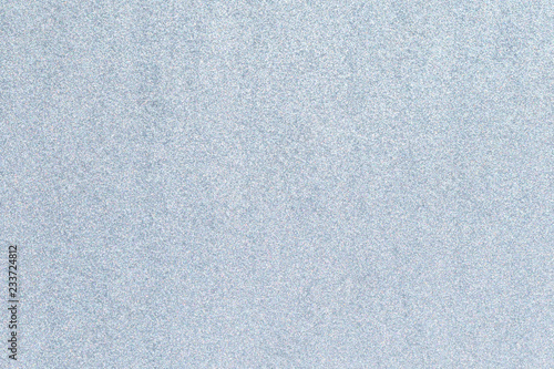 Silver glitter full frame textured shiny abstract background.