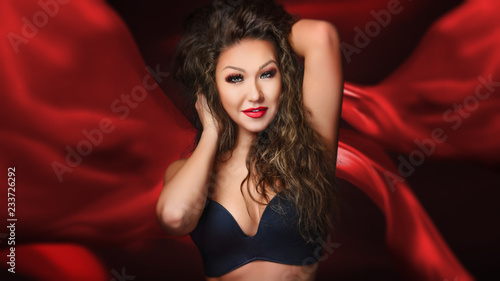 Portrait of young woman in sexy lingerie - red © Igor Link
