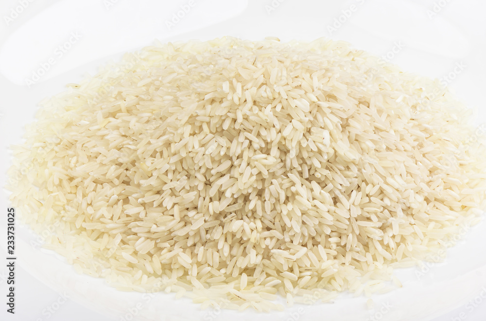 Puffed rice on white plate. Grocery concept. Puffed rice on white plate. Grocery concept.