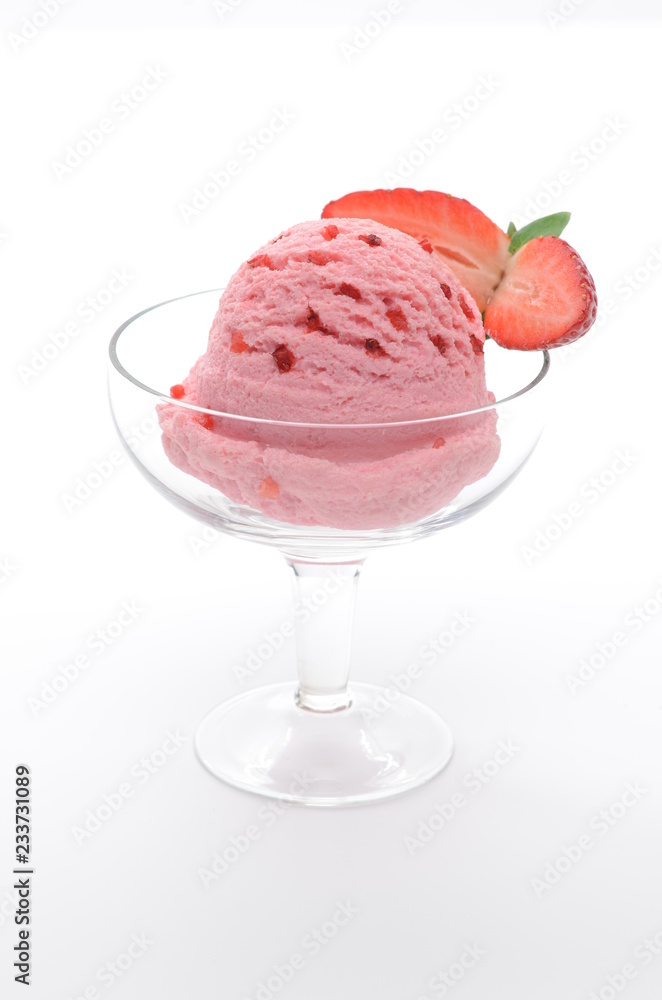 Strawberry ice cream in sundae cup or glass with fruits isolated on white background Strawberry ice cream in sundae cup or glass with fruits isolated on white background