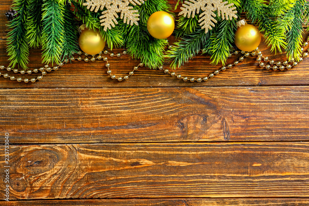 Christmas decorations with space for text on wooden background Christmas decorations with space for text on wooden background