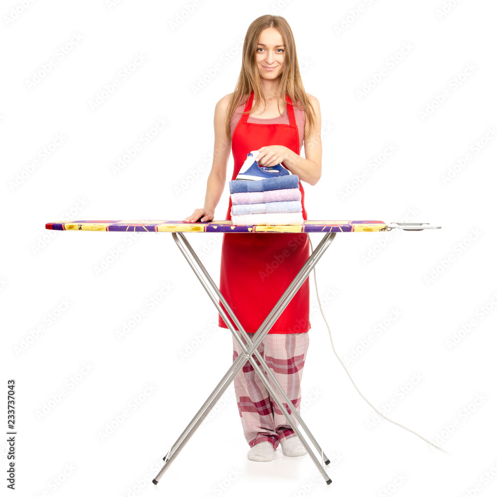 Beautiful woman in apron stack towels clean ironing board iron on white background isolation Beautiful woman in apron stack towels clean ironing board iron on white background isolation