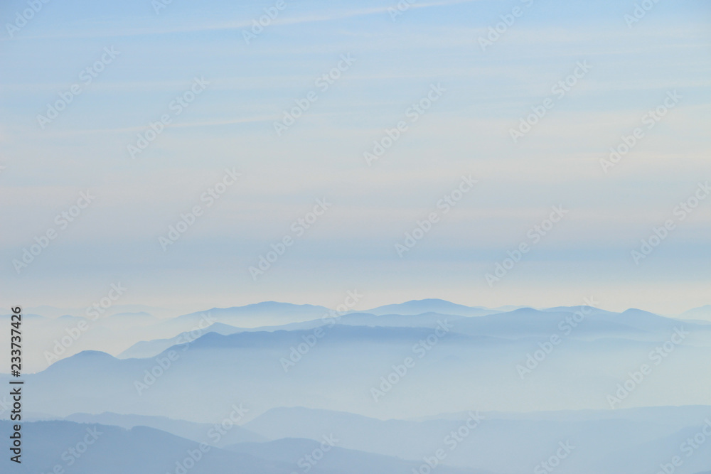 Panoramic view of beautiful landscape Carpathian mountains (Borzhava range) in haze