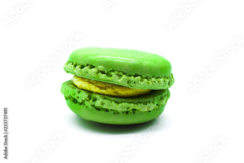 green macaron isolated on white background, one macaron