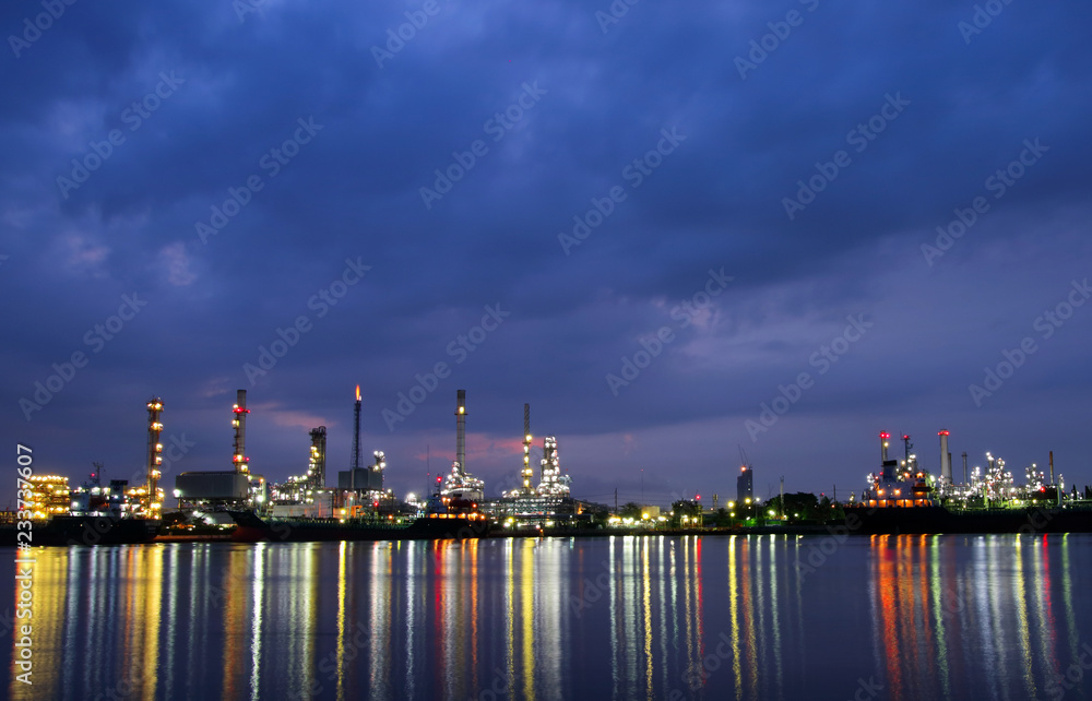 Oil refinery industry plant along twilight morning
