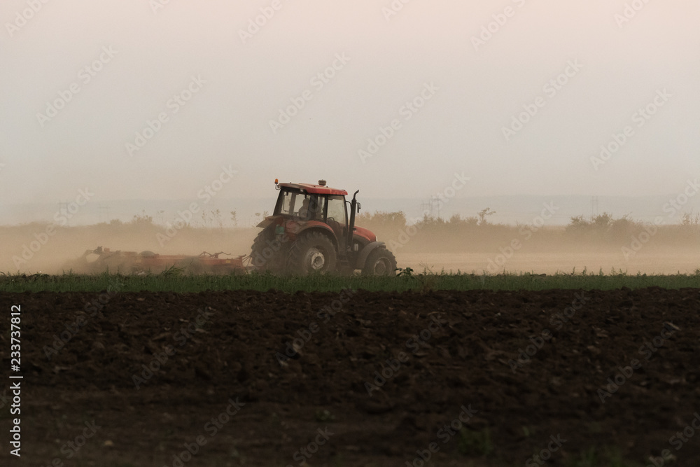 Fototapeta premium Plowing of stubble field