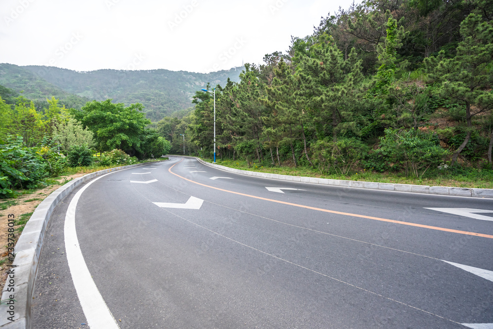 empty road with city skyline