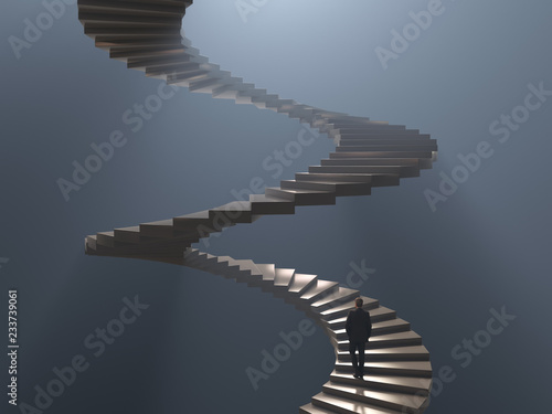 man climbs the spiral staircase