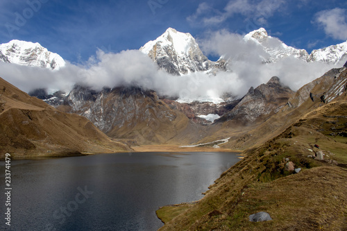 Panoramic View from the western end of Lagona Carhuacocha to Mount Yerupajá, Andes Mountains, Peru photo