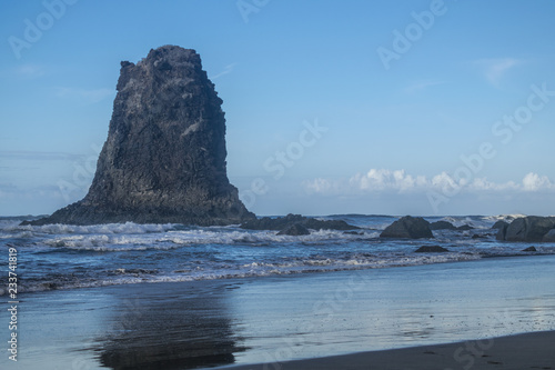 Benijo beach with big rock and Atlantic ocean view with sunset light, Anaga natural park, Tenerife, Canary islands, Spain