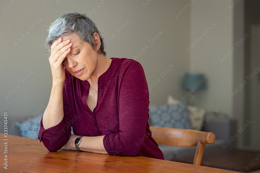 Stressed senior woman at home - obrazy, fototapety, plakaty 
