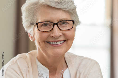 Senior woman wearing spectacles photo