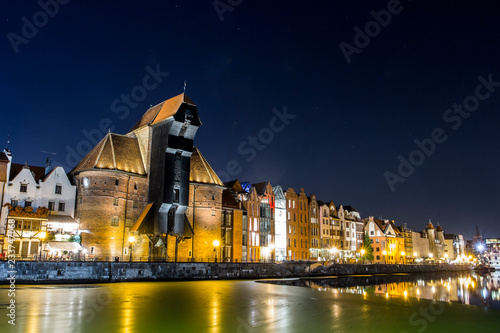 Historical buildings on the promenade of Gdansk at night. Poland