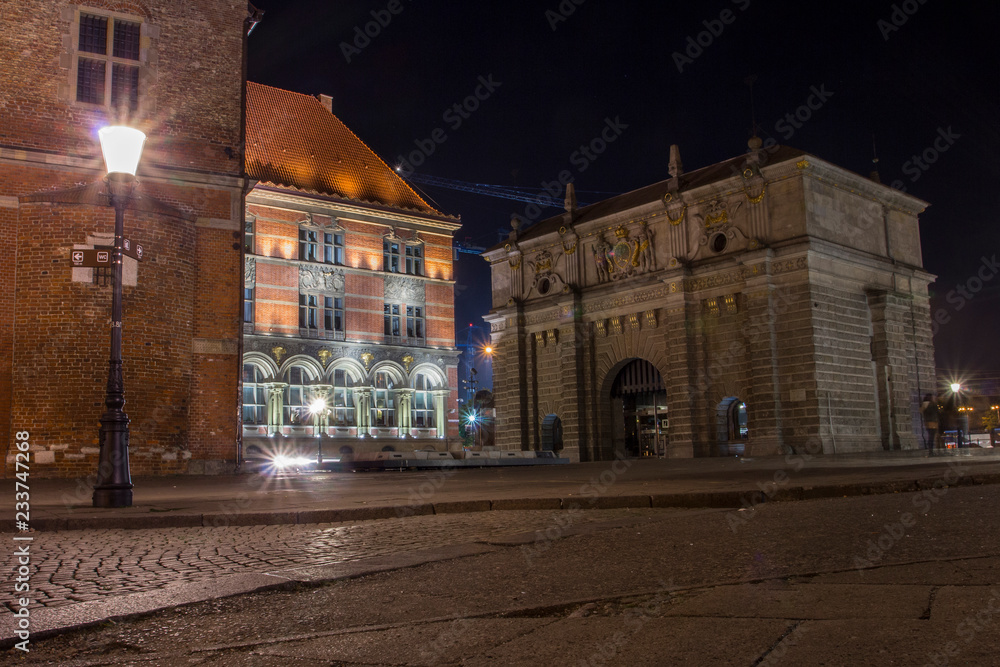 Old historic Gate in Gdansk at night, Poland, is one of the city's most notable tourist attractions.