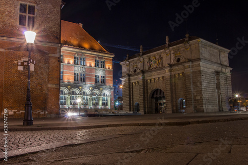 Old historic Gate in Gdansk at night, Poland, is one of the city's most notable tourist attractions.