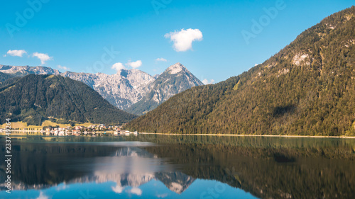 Fototapeta Naklejka Na Ścianę i Meble -  Beautiful alpine view with reflections at the Achensee - Maurach - Tyrol - Au