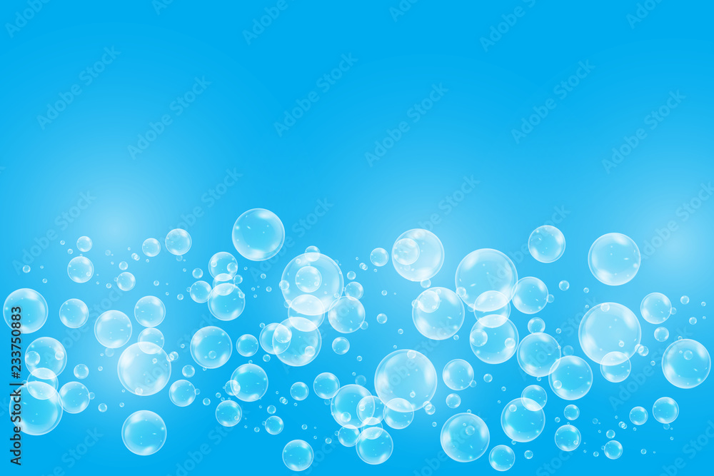 Realistic soap bubbles with rainbow reflection set isolated on the blue background