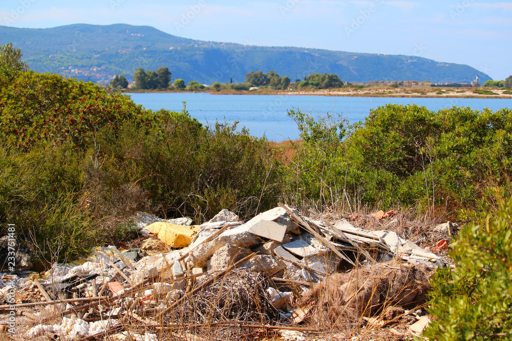 Garbage dumped in beautiful nature around the lagoons near Lefkada town, Greece