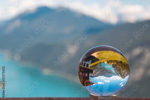 Crystal ball alpine landscape shot at Achensee - Pertisau - Tyrol - Austria © Martin Erdniss