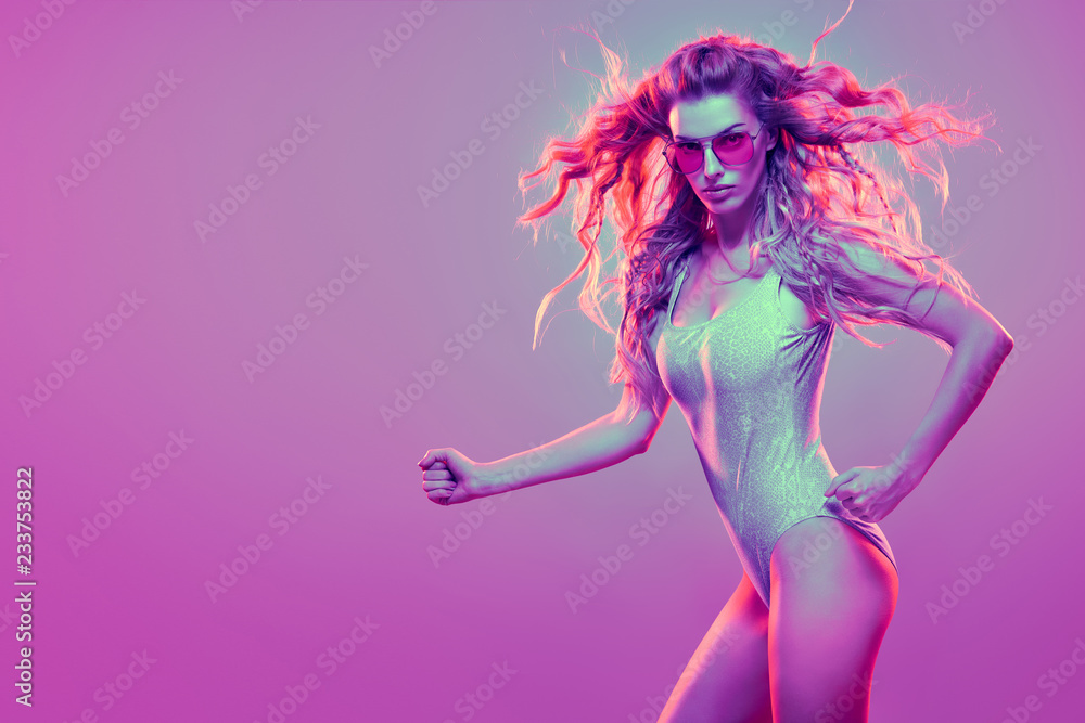 Warrior woman in Pink Blue neon light, Trendy Hairstyle. High Fashion. Sexy adorable long-haired Girl, Stylish Sunglasses. Design Art concept. Creative Colorful Bright Portrait