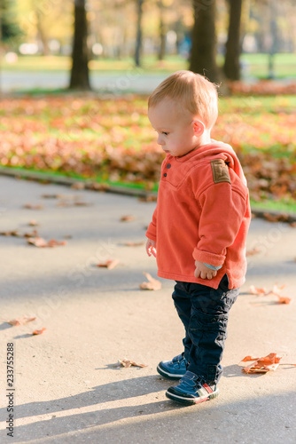 Cute little boy walking in the park © qunica.com